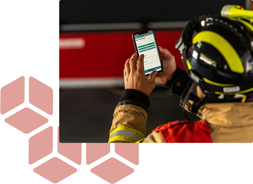 Fire fighter using GRID next to HM government G-Cloud supplier logo