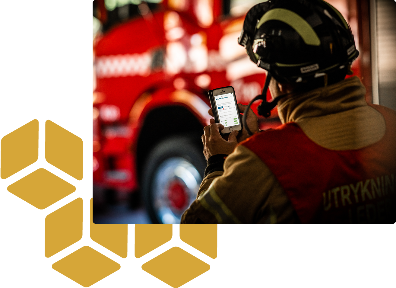Fire fighter uses GRID next to fire engine