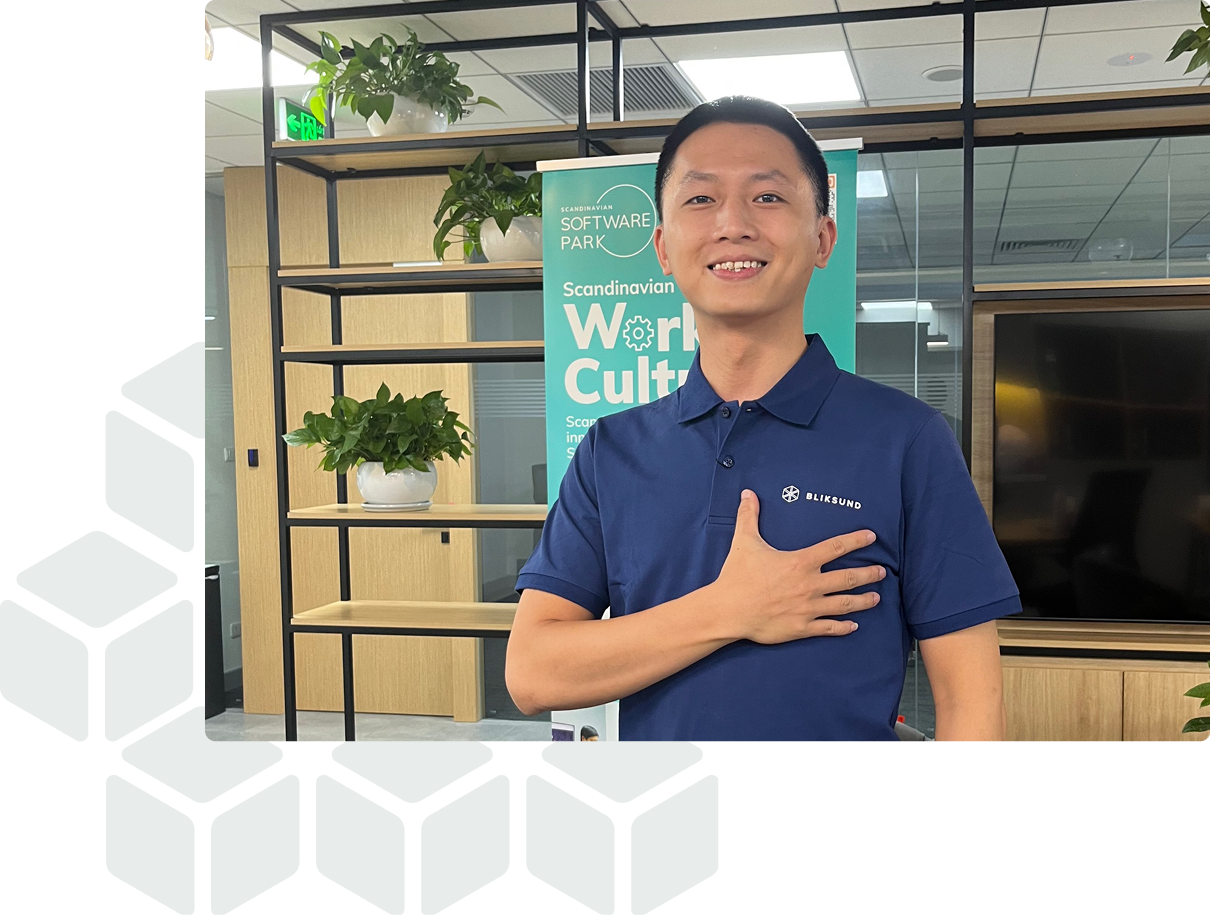 An employee from bliksund's office in Vietnam smiles